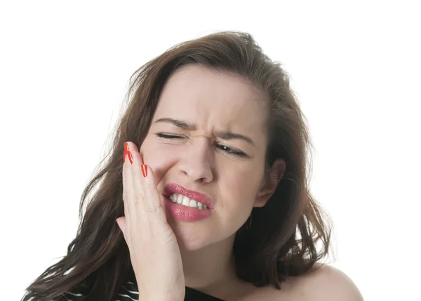 Mulher com dor de dente segurando sua bochecha — Fotografia de Stock