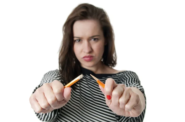 Mujer rompiendo lápiz aparte — Foto de Stock