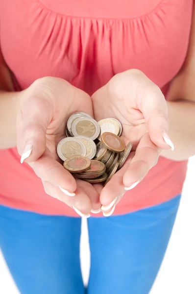 Woman with hand full of euro coins — Stock Photo, Image