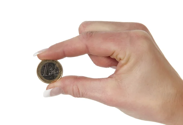 Mano sosteniendo moneda de euro entre dos dedos — Foto de Stock