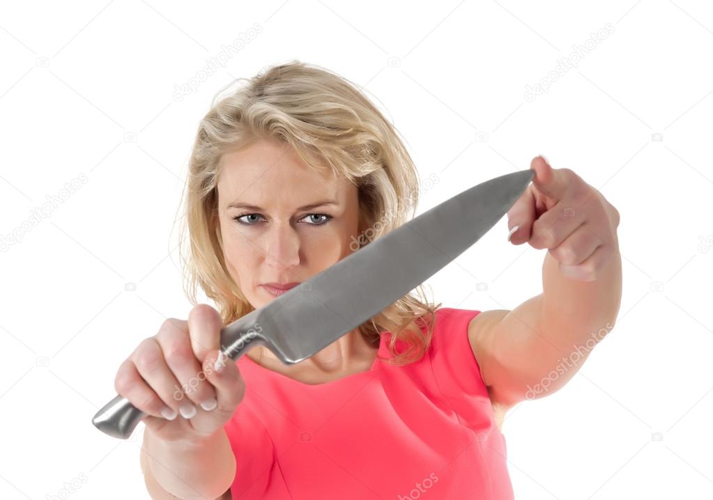 Aggressive woman with kitchen knife