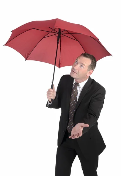 Geschäftsmann mit Regenschirm — Stockfoto