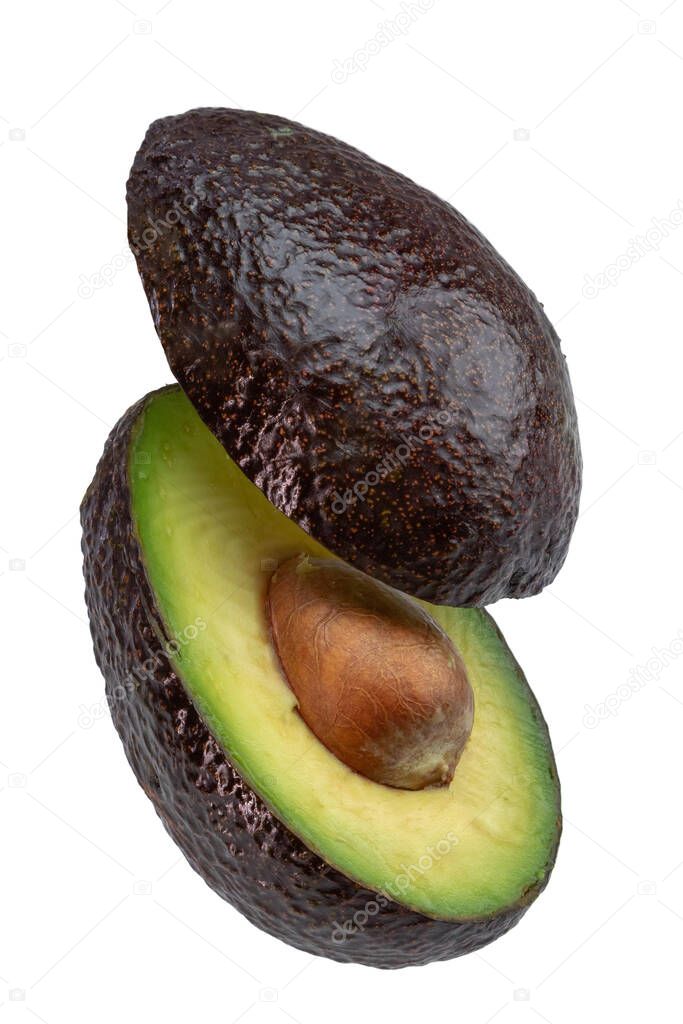 Fresh ripe avocado flying in the air on a white background