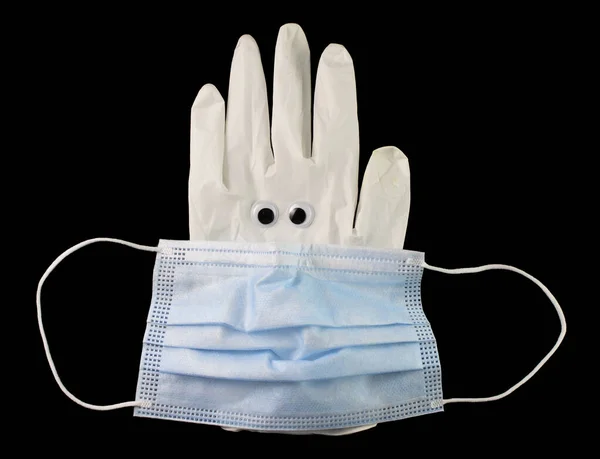 Medical mask with medical gloves on the black background — Stock Photo, Image