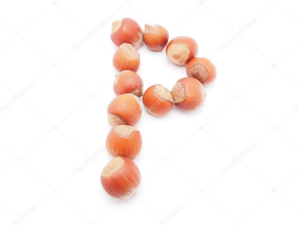 Hazelnuts letter — Stock Photo © Enskanto 12698795