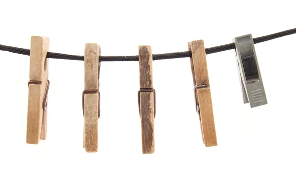 Clothespins and rope on a white background — Stock Photo, Image