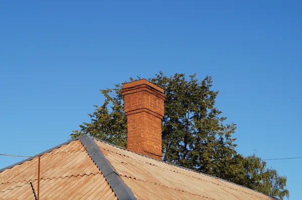 Bricks chimney on the roof — Stock Photo, Image