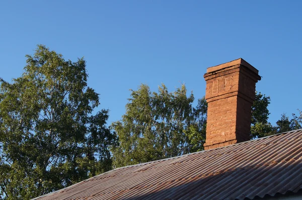 Bricks chimney on the roof — Stock Photo, Image