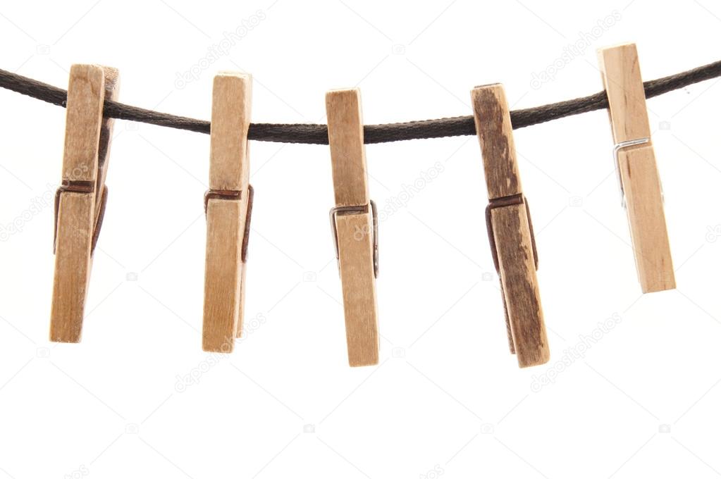 Clothespins and rope on a white background
