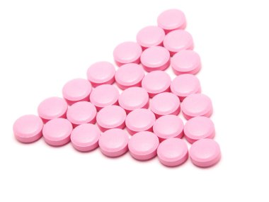 beyaz zemin üzerinde pembe tabletleri