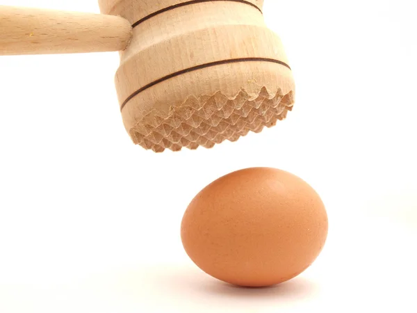 Hammer and eggs — Stock Photo, Image