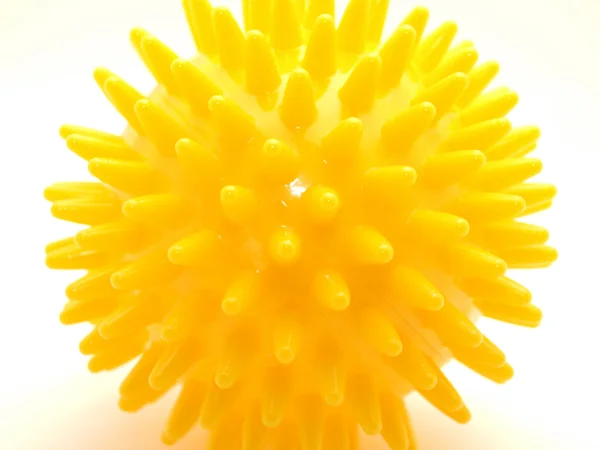 Yellow ball in thorns — Stock Photo, Image