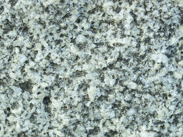 Tło, bardzo szczegółowe tekstury powierzchni skały granitowe — Zdjęcie stockowe
