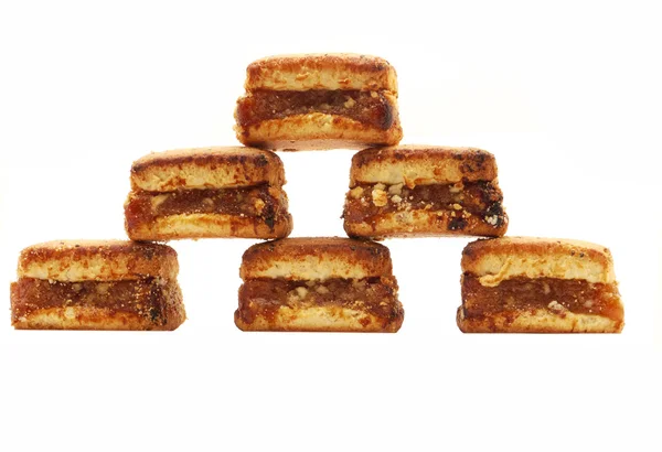 Pyramid of biscuits on a white background — Stok fotoğraf