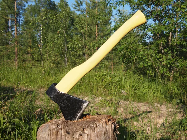 Photo of axe in the stump — Stock Photo, Image