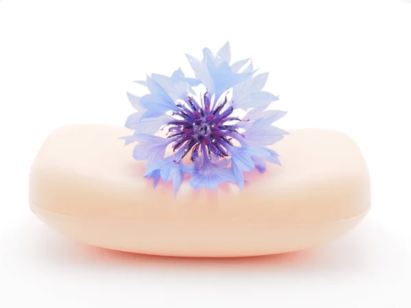 Cornflowers and soap on a white background — Stock Photo, Image