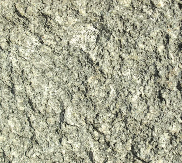背景，高度详细的花岗岩岩石表面纹理 免版税图库照片