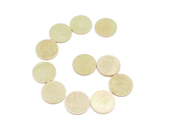 Buchstaben von Münzen auf weißem Hintergrund — Stockfoto