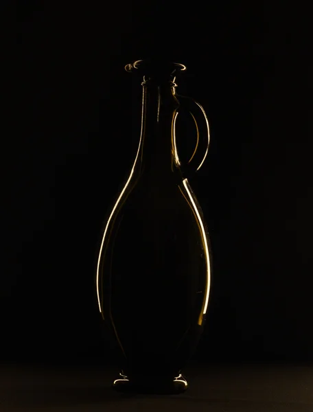Flasche auf schwarzem Hintergrund — Stockfoto