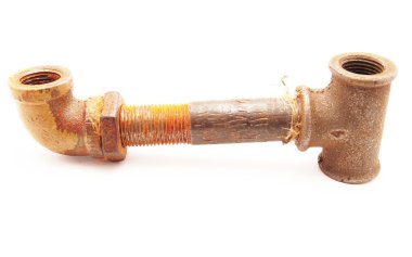 Old a pipe on a white background