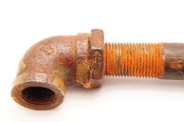 Old a pipe on a white background