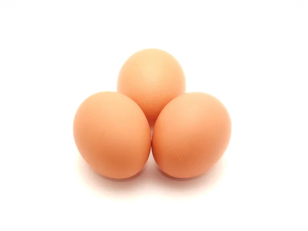 Tři vejceκόκκινο κραγιόν και ροζ χρυσάνθεμο — Stock fotografie