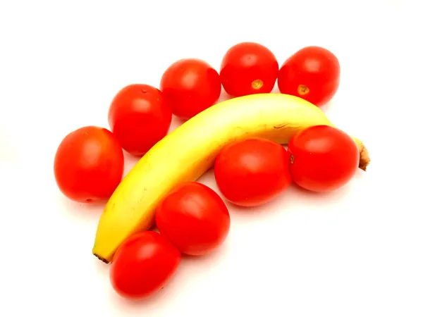 Banana and tomatoes — Stock Photo, Image