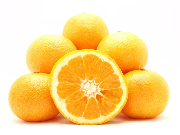 Мандарины и апельсин — стоковое фото