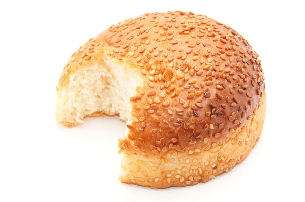 Bun with sesame seeds on a white background — Stock Photo, Image