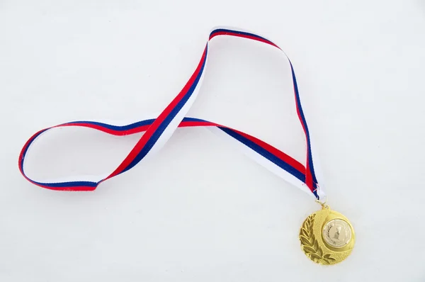 Medaille op een sneeuw — Stockfoto