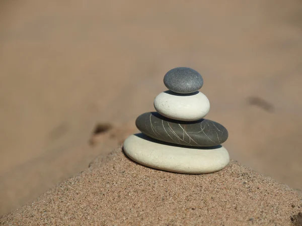 Pebbles in the sand — Stock Photo, Image