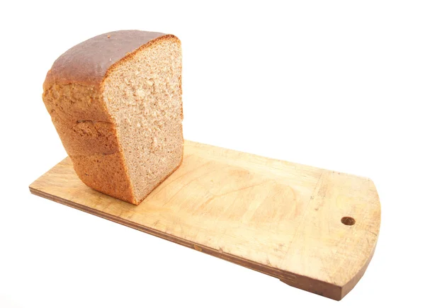 Pão e placa de cozinha em um fundo branco — Fotografia de Stock