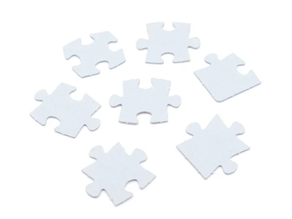 Puzzel op een witte achtergrond — Stockfoto