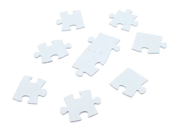 Puzzel op een witte achtergrond — Stockfoto
