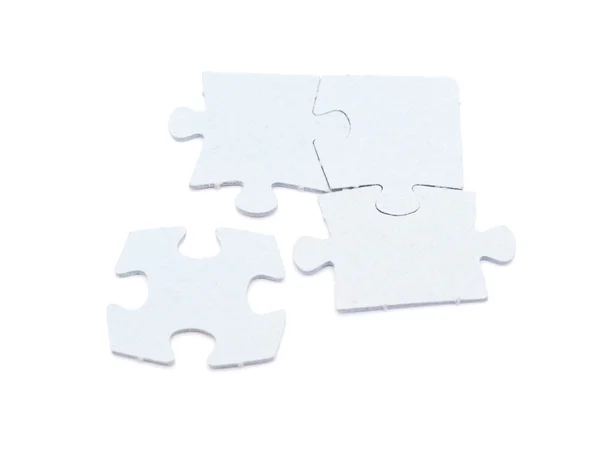 Puzzel op een witte achtergrond — Stockfoto