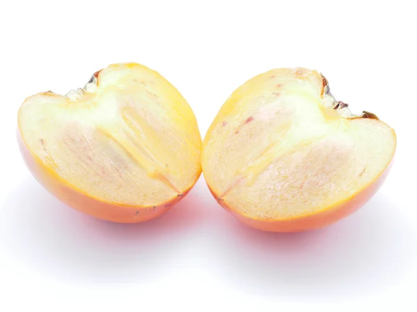 Persimmon em um fundo branco — Fotografia de Stock