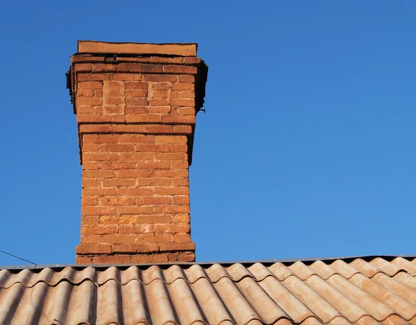 Brick chimney house — Stock Photo, Image