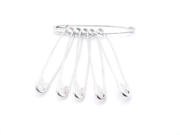 Pins on a white background — Stock Photo, Image