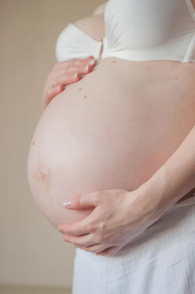 A pregnant woman's belly — Stock Photo, Image