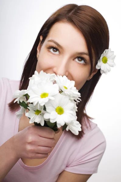 Smelling flowers Royalty Free Stock Images