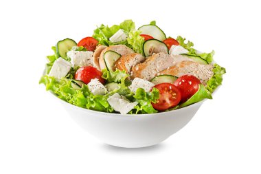 Fresh green salad with chicken breast feta cheese and tomato isolated on white background