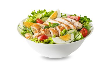 Fresh green salad with chicken breast and boiled egg isolated on white background 