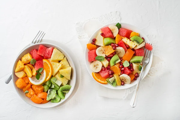 Bowls Fresh Mixed Fruit Salad White Background Top View — 스톡 사진