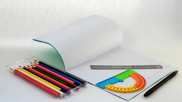 Notebook Pen Ruler Protractor Set Colored Pencils Drawing White Background — Stockfoto