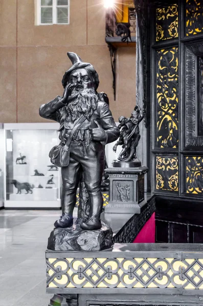 black cast iron gnome statue