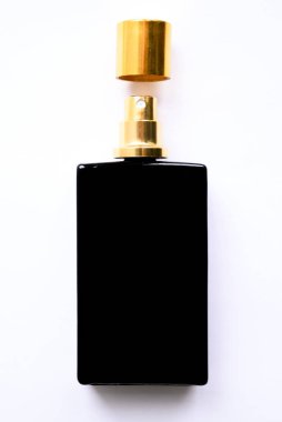 black perfume and eau de toilette bottle with golden cap