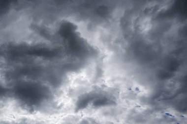 blue sky with gray storm clouds before rain