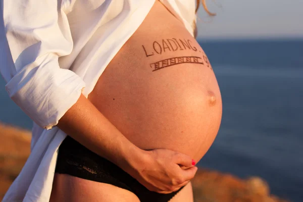 Burta femeii gravide — Fotografie, imagine de stoc
