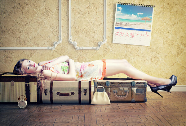woman, sleeping on the luggage