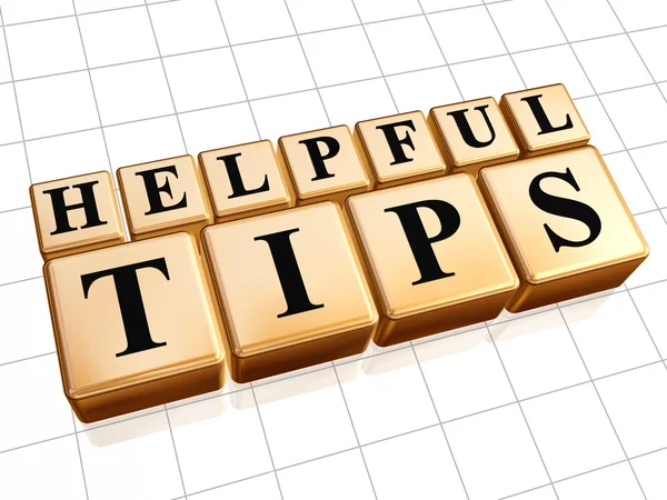 Helpful tips in golden cubes — Stock Photo, Image